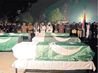 fallen heroes security officials offer funeral prayers for the police officers martyred in a suicide bombing in swat on sunday photo afp