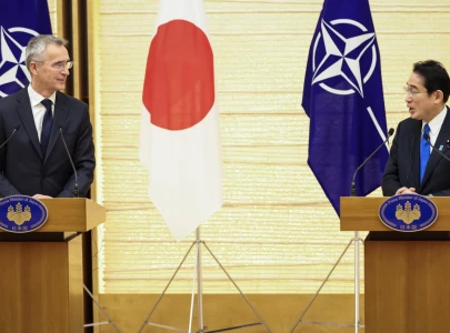 japan and nato pledge firm response to china russia threats