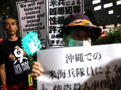 dozens protest in tokyo after marine accused of murder in okinawa