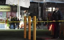 japan stabbing liquid spray attack injures 15