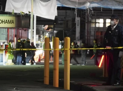 japan stabbing liquid spray attack injures 15