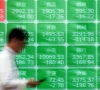 a man walks past a screen displaying stock index prices outside a brokerage in tokyo japan on march 30 2026 photo reuters a man walks past a screen displaying stock index prices outside a brokerage in tokyo japan on march 30 2026 photo reuters