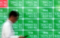 a man walks past a screen displaying stock index prices outside a brokerage in tokyo japan on march 30 2026 photo reuters a man walks past a screen displaying stock index prices outside a brokerage in tokyo japan on march 30 2026 photo reuters