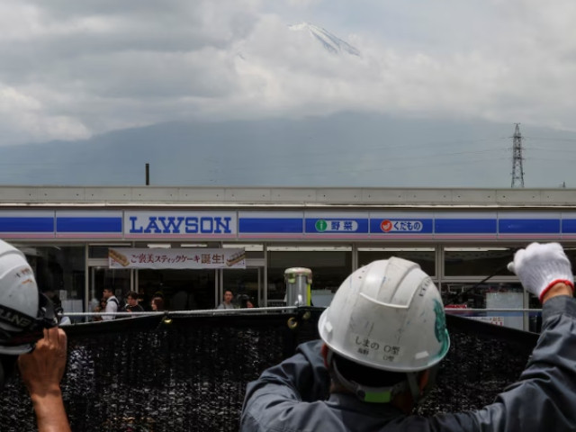 swarmed with tourists japan town blocks off viral view of mt fuji swarmed with tourists japan town blocks off viral view of mt fuji