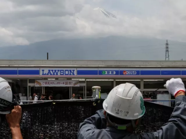 swarmed with tourists japan town blocks off viral view of mt fuji swarmed with tourists japan town blocks off viral view of mt fuji