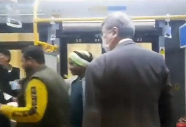 japanese consul general toshikazu isumora travelling with ordinary passengers in karachi s green line bus screengrab japanese consul general toshikazu isumora travelling with ordinary passengers in karachi s green line bus screengrab