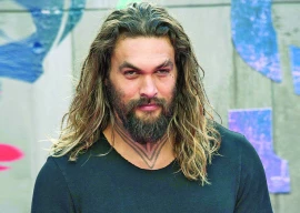 momoa recalls near death surfing experience in hawaii
