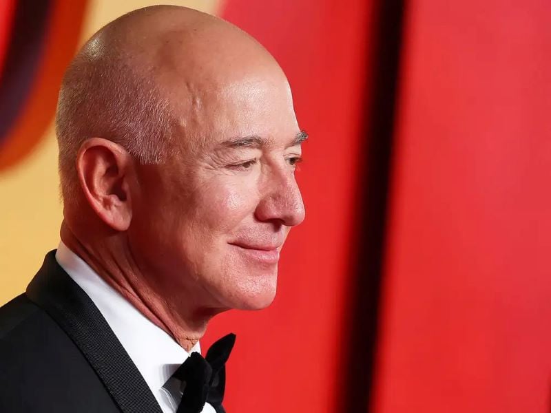 bezos who owns nearly 9 of amazon has seen the value of his shares jump more than 40 this year photo bloomberg