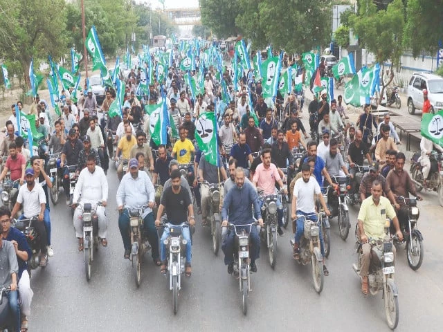 ji karachi ameer monem zafar khan leads a protest rally on two wheels against the sindh govt s alleged number plate scam photo express ji karachi ameer monem zafar khan leads a protest rally on two wheels against the sindh govt s alleged number plate scam photo express