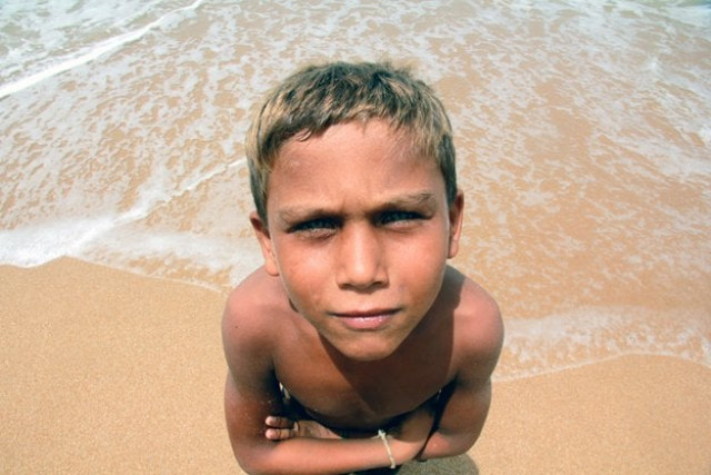 the children of mubarak village say they have been playing in the sea since they were very young photo athar khan express the children of mubarak village say they have been playing in the sea since they were very young photo athar khan express