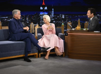 pierce brosnan struggles with jimmy fallon s spicy salsa during tonight show appearance pierce brosnan struggles with jimmy fallon s spicy salsa during tonight show appearance