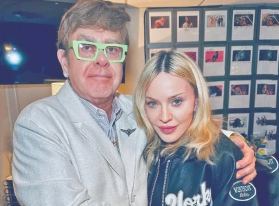 elton and madonna bury the hatchet not the beat elton and madonna bury the hatchet not the beat