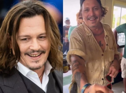 johnny depp flaunts sparkly new smile after viral rotting teeth backlash johnny depp flaunts sparkly new smile after viral rotting teeth backlash