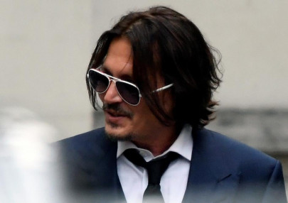 johnny depp launches legal action against british tabloid johnny depp launches legal action against british tabloid