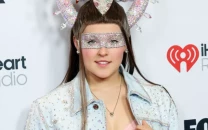 jojo siwa stuns at 2025 iheartradio music awards with towering wig and dazzling denim ensemble jojo siwa stuns at 2025 iheartradio music awards with towering wig and dazzling denim ensemble