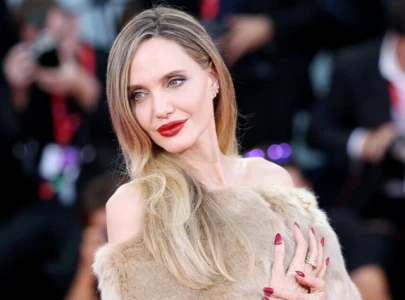 angelina jolie pays tribute to maria callas at venice film festival with cartier jewelry angelina jolie pays tribute to maria callas at venice film festival with cartier jewelry