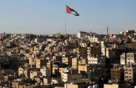 a jordanian flag flies over the capital city amman jordan august 17 2025 reuters