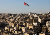 a jordanian flag flies over the capital city amman jordan august 17 2025 reuters