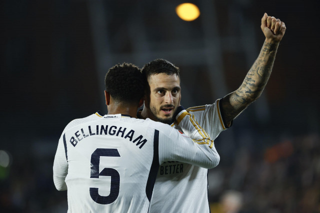 joselu double sends madrid top at getafe