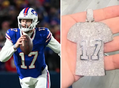 josh allen receives custom mvp chain with gold diamonds from dion dawkins
