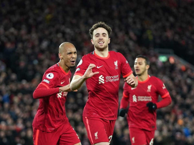 jota double keeps liverpool in title hunt