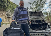 al mayadeen journalist jamal al gharabi holds the press vest of one of the two lebanese journalists who were killed by a targeted israeli strike amid escalating hostilities between israel and hezbollah as the u s israeli conflict with iran continues in jezzine in southern lebanon march 28 2026 the sign on the vest reads press picture taken with a mobile phone reuters al mayadeen journalist jamal al gharabi holds the press vest of one of the two lebanese journalists who were killed by a targeted israeli strike amid escalating hostilities between israel and hezbollah as the u s israeli conflict with iran continues in jezzine in southern lebanon march 28 2026 the sign on the vest reads press picture taken with a mobile phone reuters