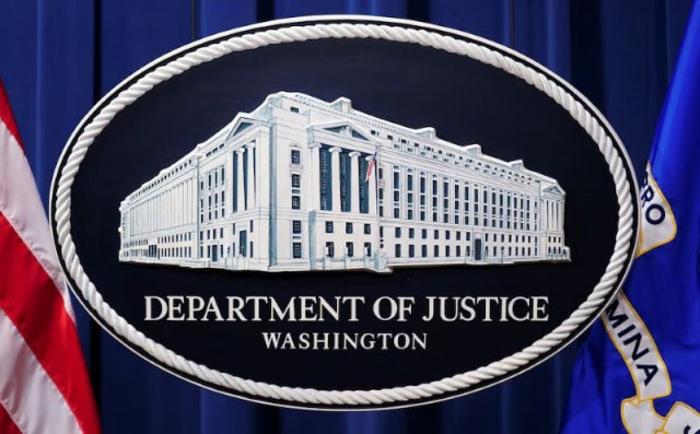 a us justice department logo or seal showing justice department headquarters known as main justice is seen behind the podium in the department s headquarters briefing room before a news conference with the attorney general in washington january 24 2023 photo reuters a us justice department logo or seal showing justice department headquarters known as main justice is seen behind the podium in the department s headquarters briefing room before a news conference with the attorney general in washington january 24 2023 photo reuters