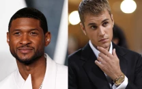 usher and justin bieber have heated exchange at beyonc s oscars after party