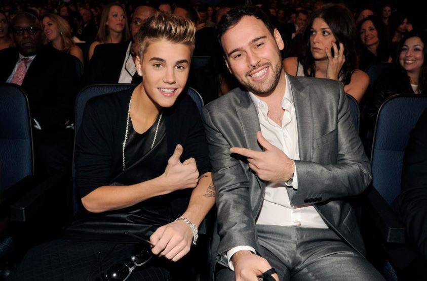 justin bieber and scooter braun during the 40th american music awards on november 18 2012 in los angeles image wire image via billboard