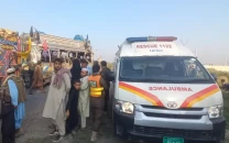 two children killed 13 injured as wedding bus collides with tractor trolley in peshawar
