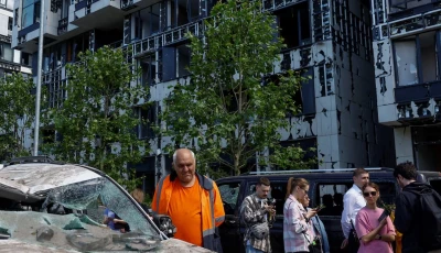 residents gather outside an apartment building damaged during russian missile and drone strikes kyiv ukraine june 2 reuters residents gather outside an apartment building damaged during russian missile and drone strikes kyiv ukraine june 2 reuters