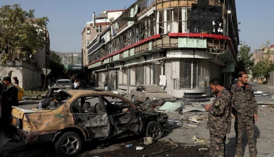 file members of afghan security forces keep watch at the site of yesterday s night time car bomb blast in kabul afghanistan august 4 2021 photo reuters
