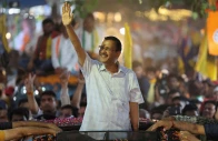 people gather as delhi s chief minister arvind kejriwal attends a roadshow after india s supreme court gave temporary bail to the aam aadmi party s national convenor last week in a liquor policy case in new delhi india may 15 2024 file photo reuters