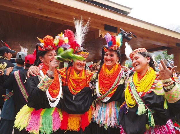 Kalasha women dance at the closing ceremony of Chilam Joshi festival in Kalash Valley. PHOTO: MUHKAMUDDIN/EXPRESS