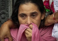 kamala bhattarai wife of pushpa raj bhattarai 46 who died in deadly flash floods and a mudslide mourns during his cremation ceremony using an effigy because the body remains missing at pashupatinath temple in kathmandu nepal september 3 2026 reuters