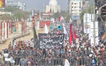 city turns out for youm e ali procession