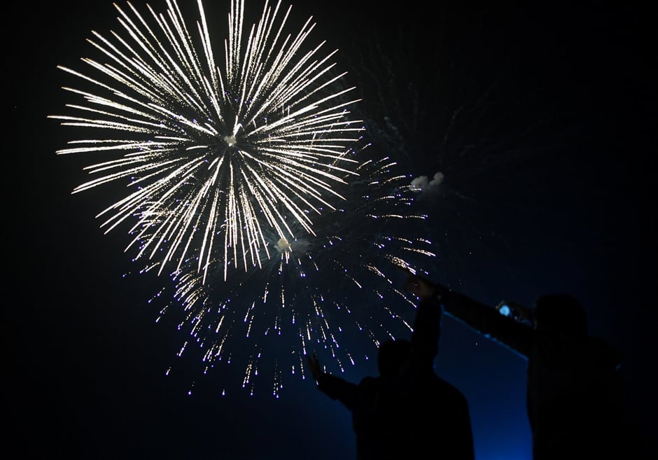 People watch the fireworks display during the New Year celebrations in Karachi. PHOTO: AFP