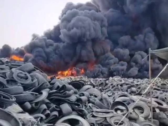 dark smoke clouds rise from a massive tyre fire in karachi s mawach goth photo express dark smoke clouds rise from a massive tyre fire in karachi s mawach goth photo express