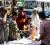civility volunteers distribute sherbet at a stall on karachi s shahrae faisal photo jalal qureshi express