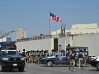 security personnel stand guard outside the us consulate in karachi on march 1 2026 photo afp security personnel stand guard outside the us consulate in karachi on march 1 2026 photo afp