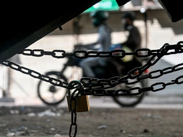 motorcyclists move past a closed shop during a nationwide strike to show their solidarity with palestinians in karachi on april 26 2025 amid the ongoing gaza conflict photo afp motorcyclists move past a closed shop during a nationwide strike to show their solidarity with palestinians in karachi on april 26 2025 amid the ongoing gaza conflict photo afp