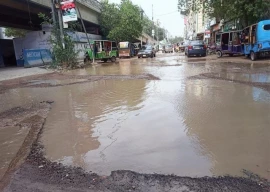 commuters bear the brunt of ruined roads in karachi commuters bear the brunt of ruined roads in karachi