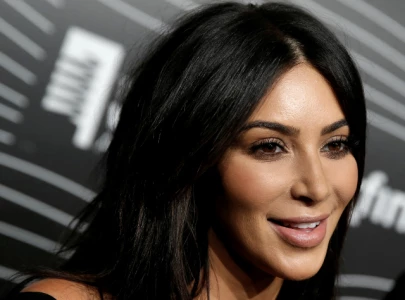 kim kardashian shares video showing her stealing herm s birkin bag sparking online reactions