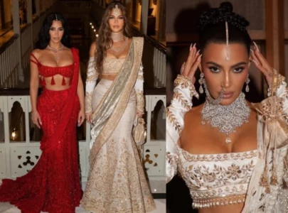 khloe and kim kardashian in over 1 000 carats of diamonds emeralds and pearls at ambani wedding