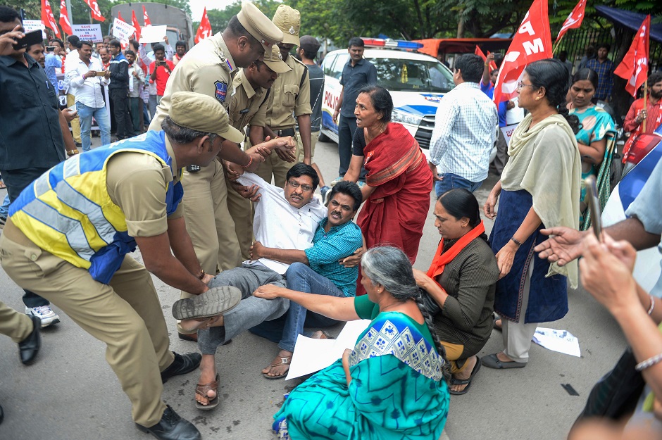 Members of the Communist Party of India are detained by police at a protest in Hyderabad on August 7, 2019, in reaction to the Indian government scrapping Article 370 that granted a special status to Jammu and Kashmir. PHOTO: AFP