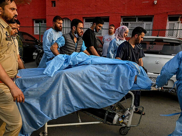 paramedics and police personnel carry an injured tourist at a hospital in anantnag south of srinagar on april 22 2025 following an attack photo afp paramedics and police personnel carry an injured tourist at a hospital in anantnag south of srinagar on april 22 2025 following an attack photo afp