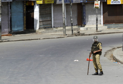 police shake up in indian kashmir amid deadly riots