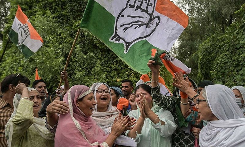 supporters of indian national congress party celebrate outside a counting centre in srinagar on october 8 afp