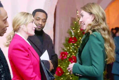 actor kate winslet speaks with princess of wales at the together at christmas carol service at westminster abbey in london photo reuters