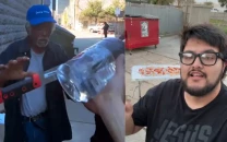 influencer sparks outrage after handing out machetes and alcohol to homeless people